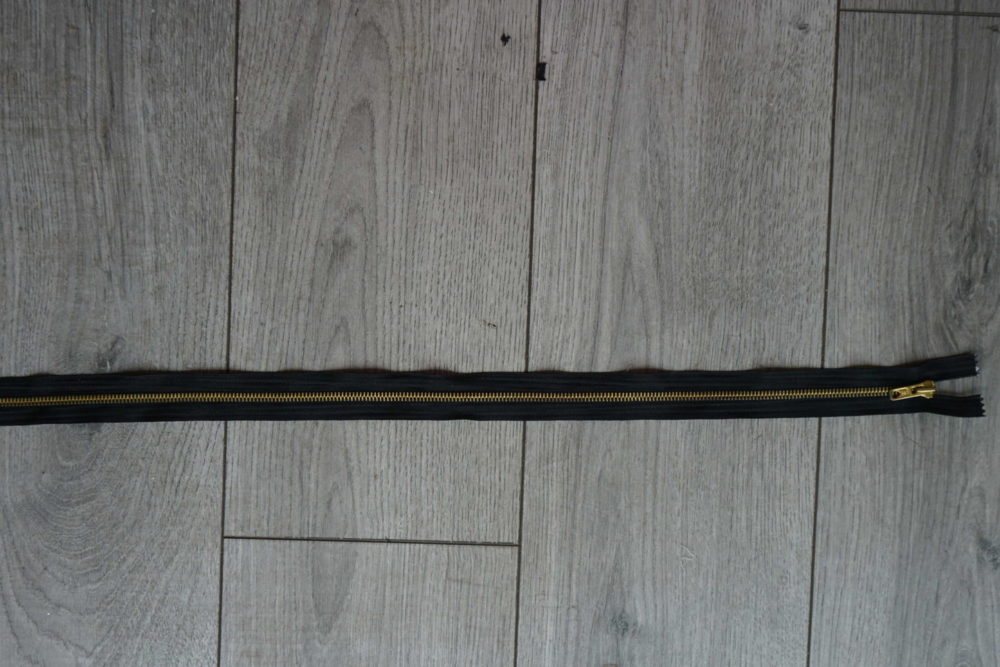 Open-Ended Black Zip with Gold Metal Teeth