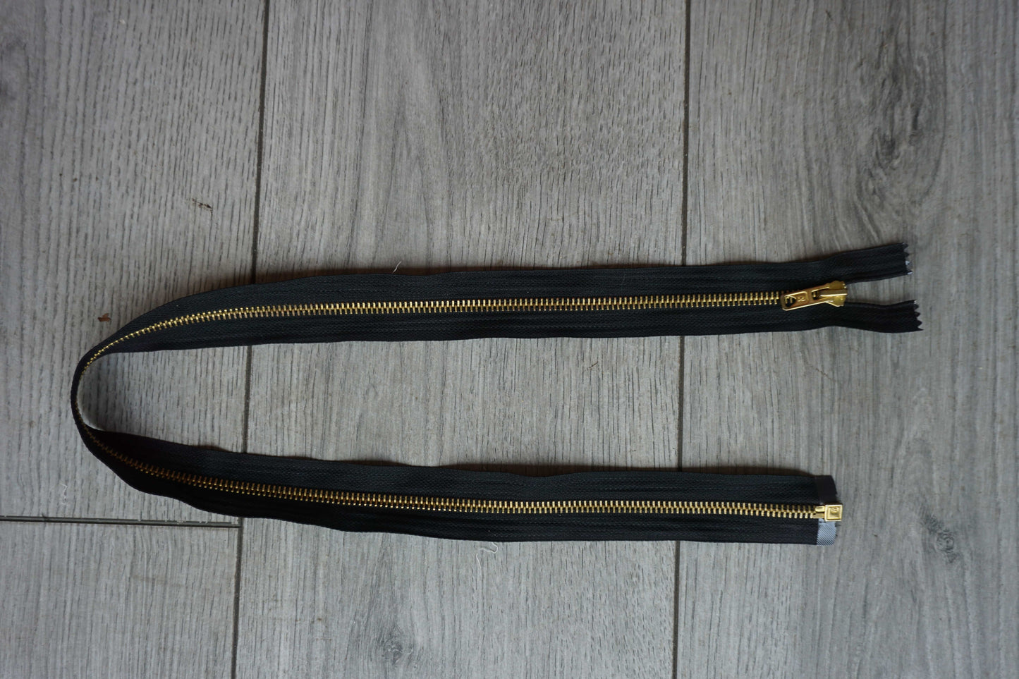 Open-Ended Black Zip with Gold Metal Teeth