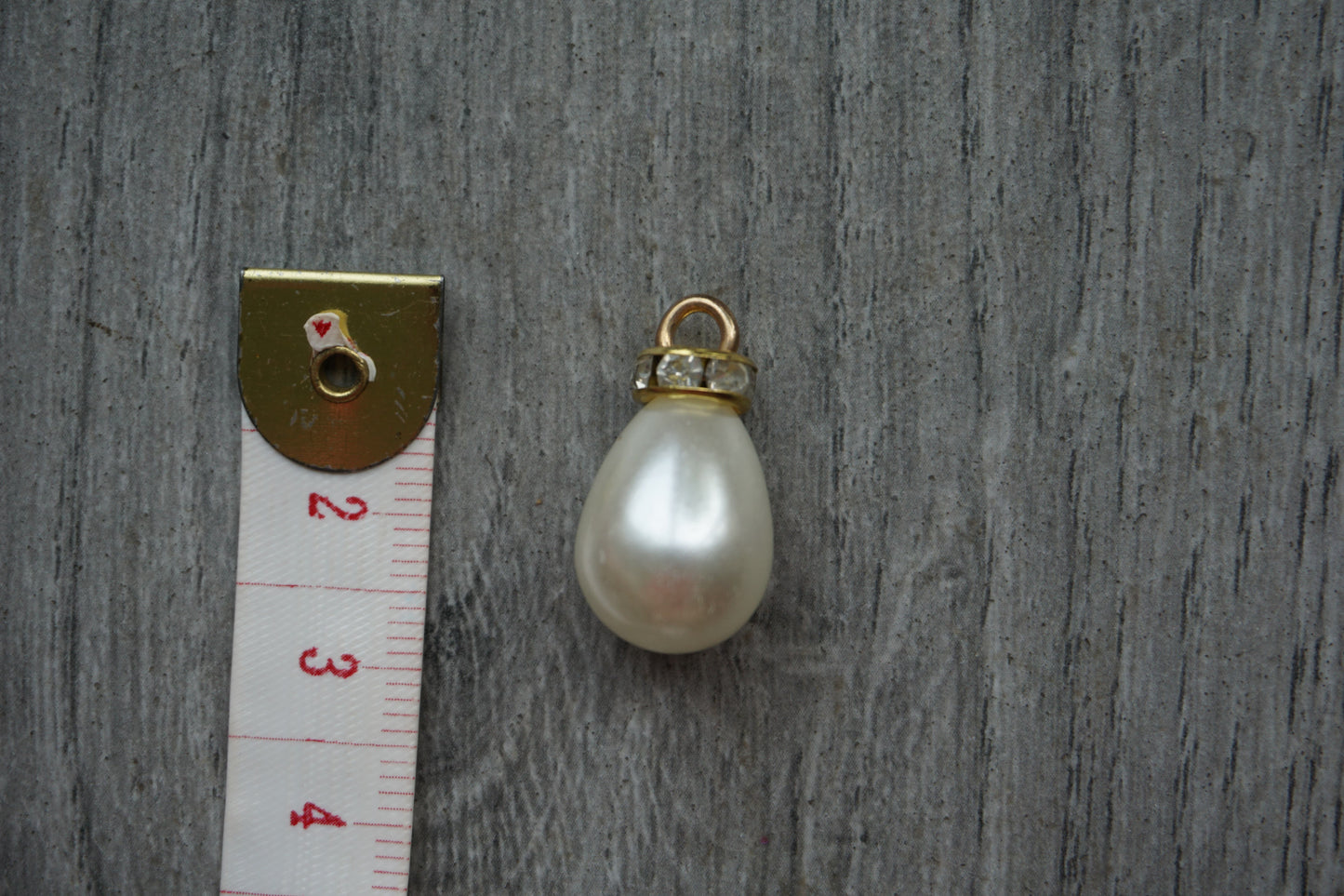 Elegant Teardrop Pearl Pendant with Gold-Tone Bail and Crystal Accents