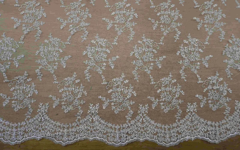 White Tulle Floral Lace with Scalloped Edge.